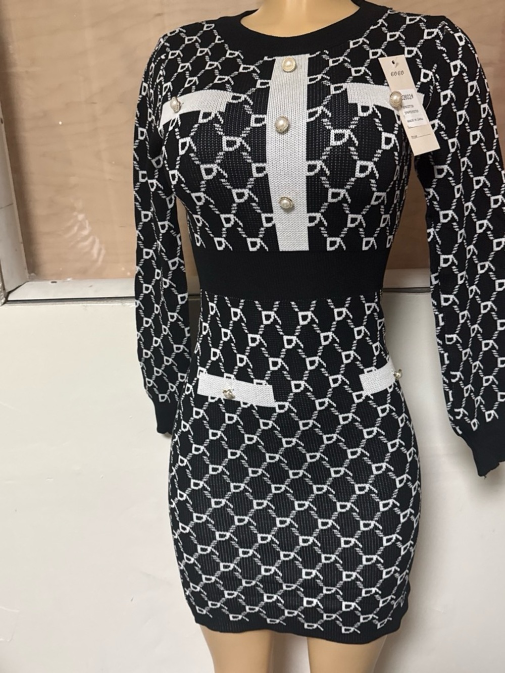 Elegant Black & White Long-Sleeve Knit Dress with Pearl Buttons